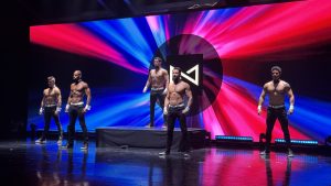 male dancers performing on stage